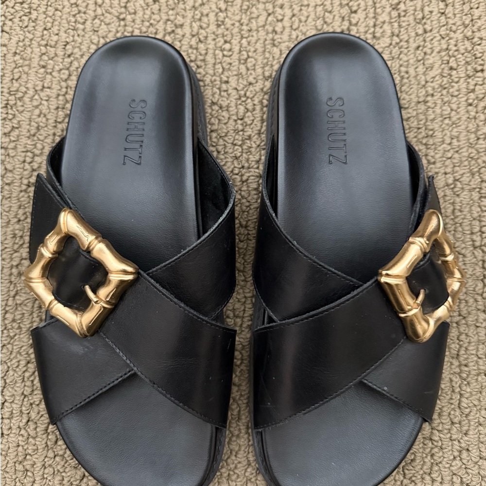 SCHUTZ Black Sandals with Gold Accent